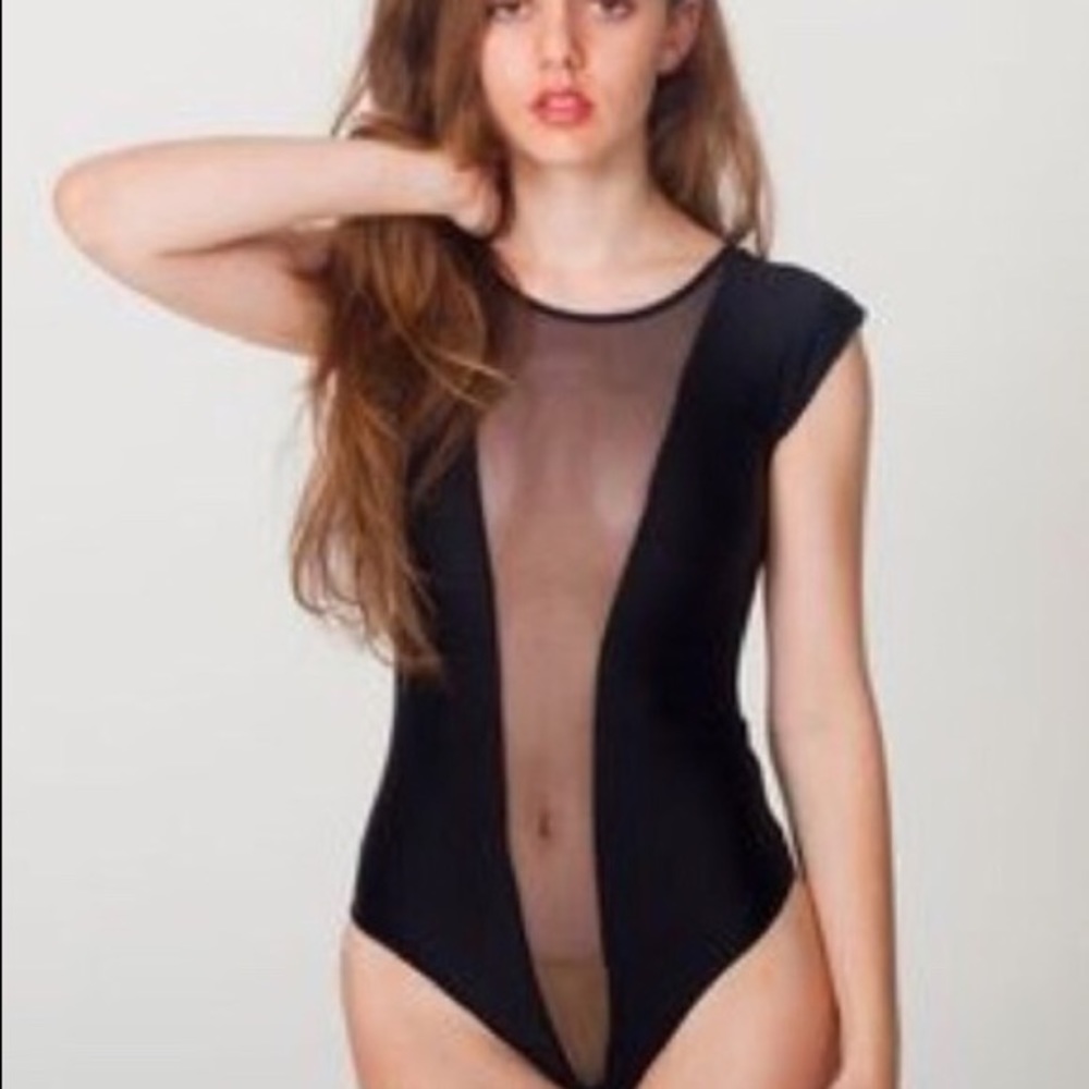 Black American Apparel bodysuit with mesh panel.